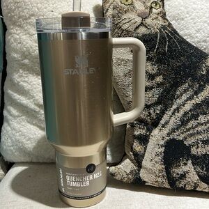 Gold 40 oz Elf Stanley collaboration tumbler